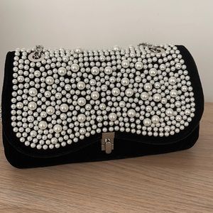 Black velvet and faux pearl bag